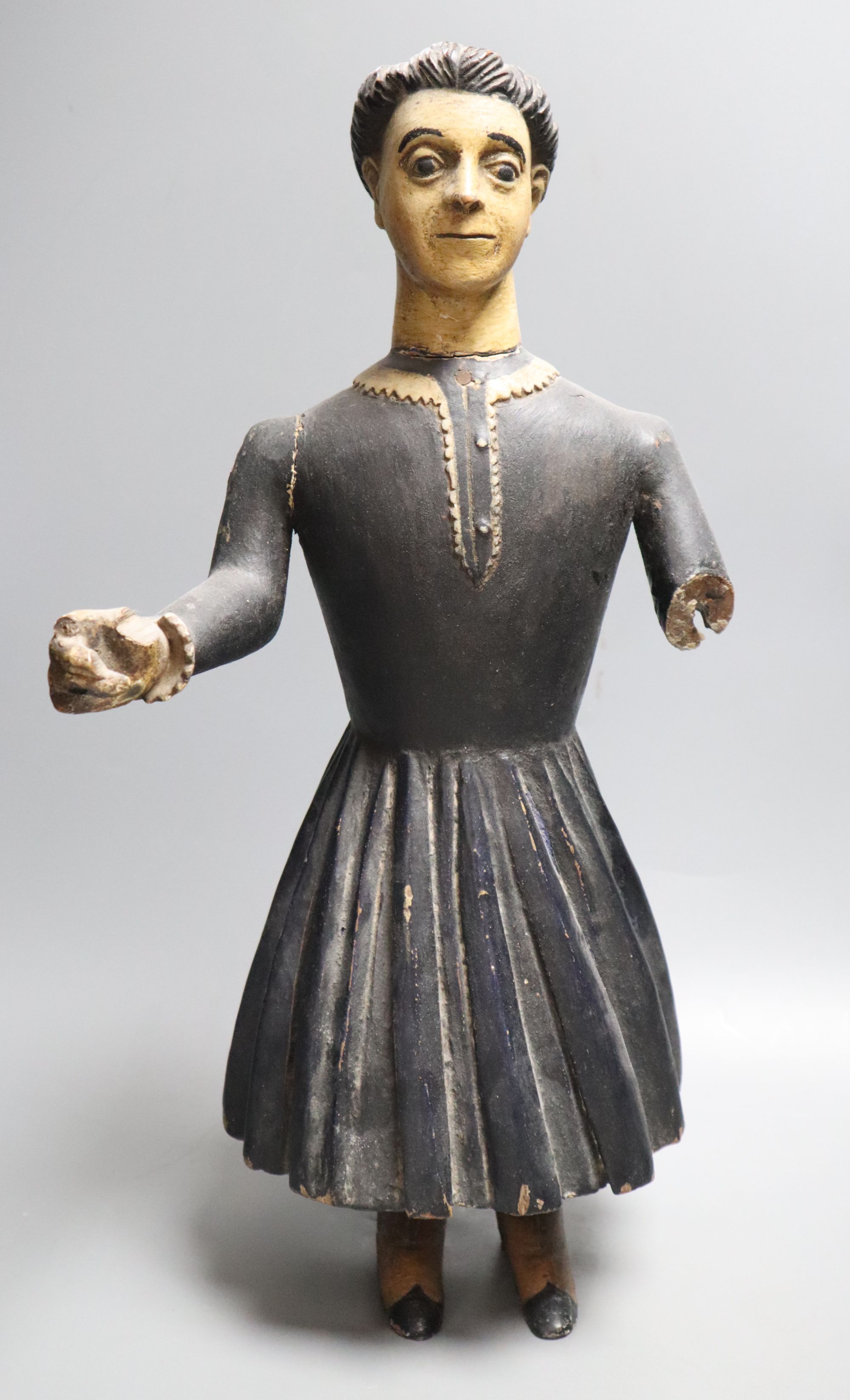 A Spanish / South American carved polychrome figure (a.f.)